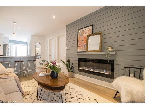 A-225 East 24Th Street, Hamilton, ON - Indoor Photo Showing Living Room With Fireplace