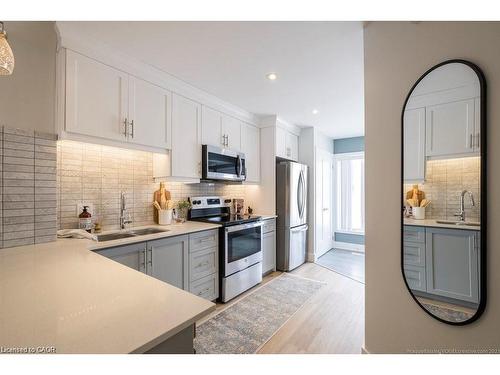 A-225 East 24Th Street, Hamilton, ON - Indoor Photo Showing Kitchen With Stainless Steel Kitchen With Double Sink With Upgraded Kitchen