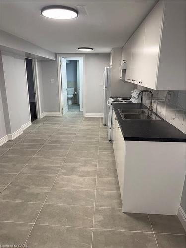 Basement-2034 Waycross Crescent, Mississauga, ON - Indoor Photo Showing Kitchen With Double Sink