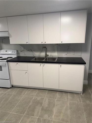 Basement-2034 Waycross Crescent, Mississauga, ON - Indoor Photo Showing Kitchen With Double Sink