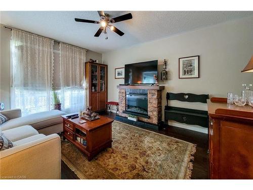 619 Porter Way, Milton, ON - Indoor Photo Showing Living Room With Fireplace