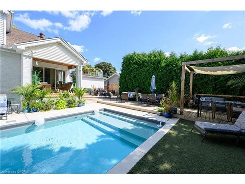 912 Boothman Avenue, Burlington, ON - Outdoor With In Ground Pool With Deck Patio Veranda With Backyard