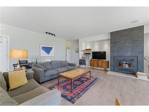 126 Shorties Side Road, Norfolk County, ON - Indoor Photo Showing Living Room With Fireplace
