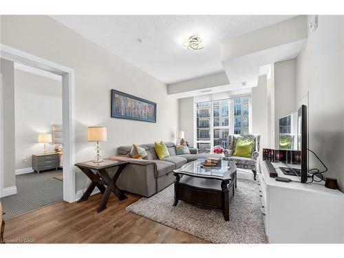 402-16 Concord Place, Grimsby, ON - Indoor Photo Showing Living Room