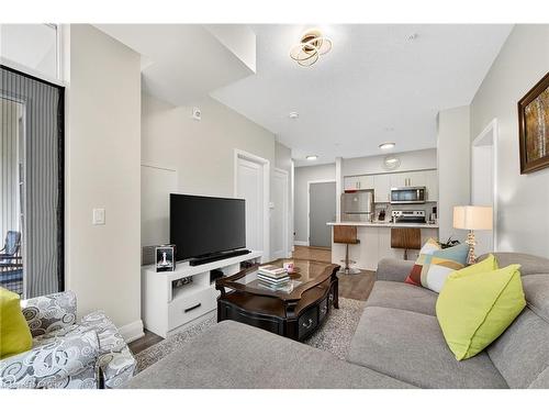 402-16 Concord Place, Grimsby, ON - Indoor Photo Showing Living Room