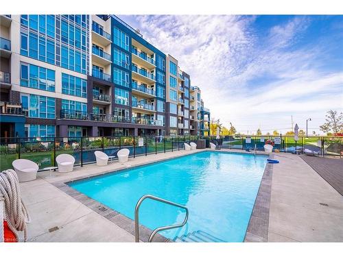 402-16 Concord Place, Grimsby, ON - Outdoor With In Ground Pool