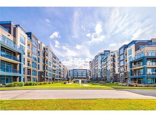 402-16 Concord Place, Grimsby, ON - Outdoor With Balcony With Facade