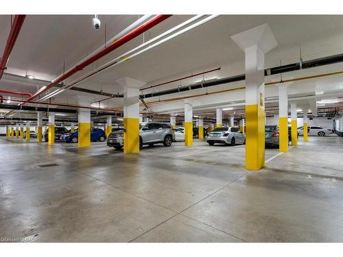 1402-385 Winston Road, Grimsby, ON - Indoor Photo Showing Garage