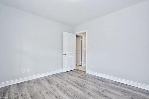 Main-21 Fife Street, Hamilton, ON - Indoor Photo Showing Other Room