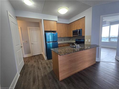 2402-330 Burnhamthorpe Road W, Mississauga, ON - Indoor Photo Showing Kitchen With Double Sink