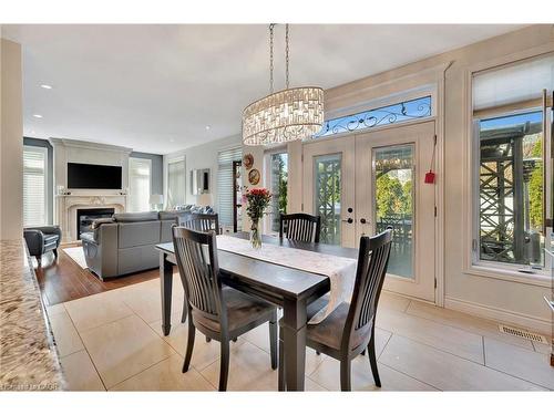 3 Rianna Court, Hamilton, ON - Indoor Photo Showing Dining Room With Fireplace
