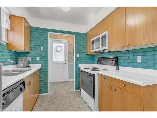 21 Willis Drive, Brampton, ON - Indoor Photo Showing Kitchen With Double Sink