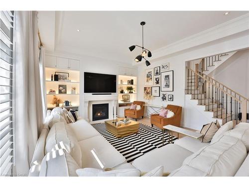 3100 Daniel Way, Oakville, ON - Indoor Photo Showing Living Room With Fireplace