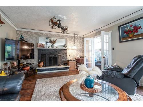 568 Strasburg Road, Kitchener, ON - Indoor Photo Showing Living Room With Fireplace