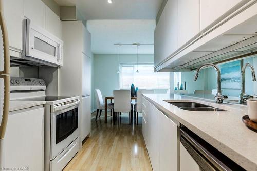 3-1556 Kerns Road, Burlington, ON - Indoor Photo Showing Kitchen With Double Sink
