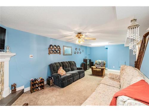 36-10 Wentworth Drive, Grimsby, ON - Indoor Photo Showing Living Room With Fireplace