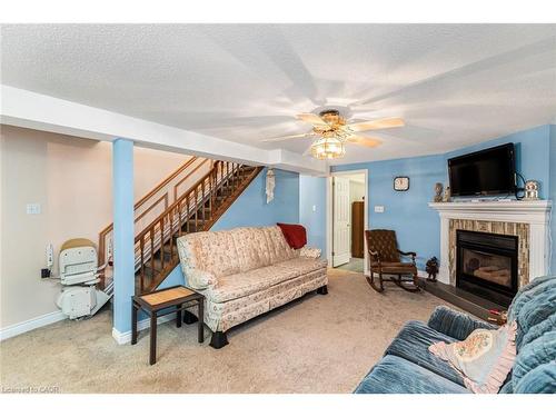 36-10 Wentworth Drive, Grimsby, ON - Indoor Photo Showing Living Room With Fireplace