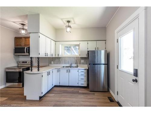 109 Carroll Street, Ingersoll, ON - Indoor Photo Showing Kitchen With Double Sink