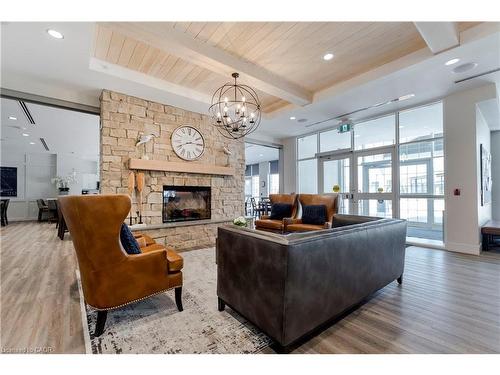 115-39 Sister Varga Terrace, Hamilton, ON - Indoor Photo Showing Living Room With Fireplace