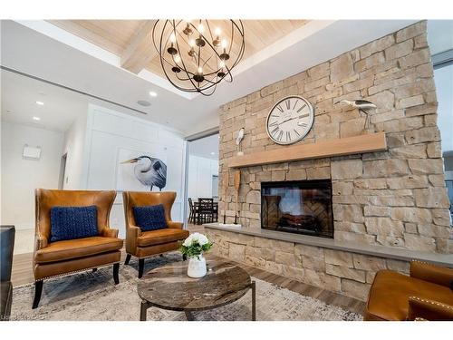 115-39 Sister Varga Terrace, Hamilton, ON - Indoor Photo Showing Living Room With Fireplace
