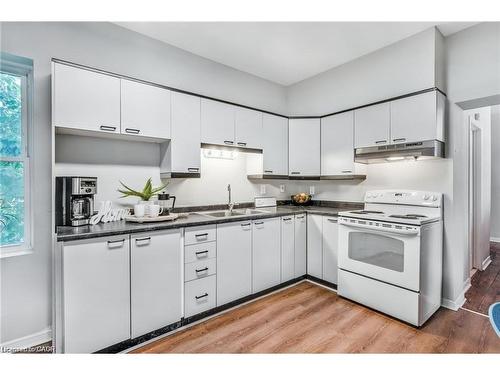 118 Queen Street S, Hamilton, ON - Indoor Photo Showing Kitchen With Double Sink