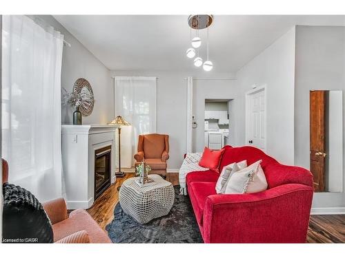 118 Queen Street S, Hamilton, ON - Indoor Photo Showing Living Room With Fireplace