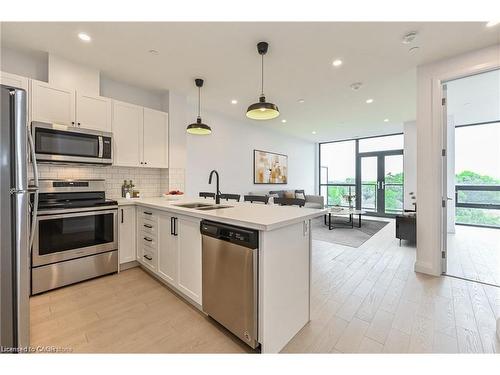 507-101 Locke Street S, Hamilton, ON - Indoor Photo Showing Kitchen With Stainless Steel Kitchen With Double Sink With Upgraded Kitchen