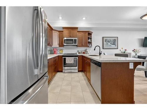 206-3290 New Street, Burlington, ON - Indoor Photo Showing Kitchen With Upgraded Kitchen