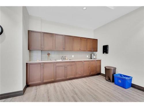 206-3290 New Street, Burlington, ON - Indoor Photo Showing Kitchen With Double Sink