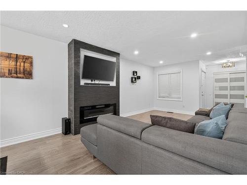 19 Marl Meadow Drive, Kitchener, ON - Indoor Photo Showing Living Room With Fireplace