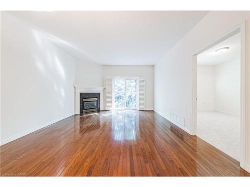 3-163 Livingston Avenue, Grimsby, ON - Indoor Photo Showing Living Room With Fireplace