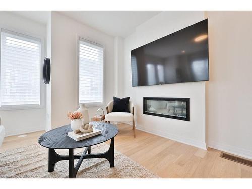 9 Crown Gate, Oakville, ON - Indoor Photo Showing Living Room With Fireplace