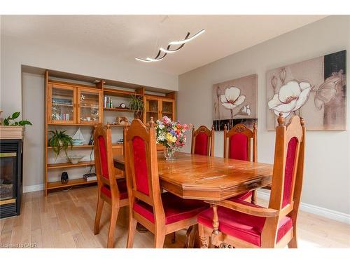 11 Apple Ridge Drive, Kitchener, ON - Indoor Photo Showing Dining Room With Fireplace