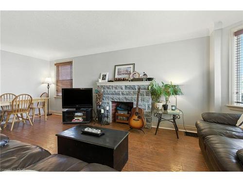 608 Fennell Avenue E, Hamilton, ON - Indoor Photo Showing Living Room With Fireplace