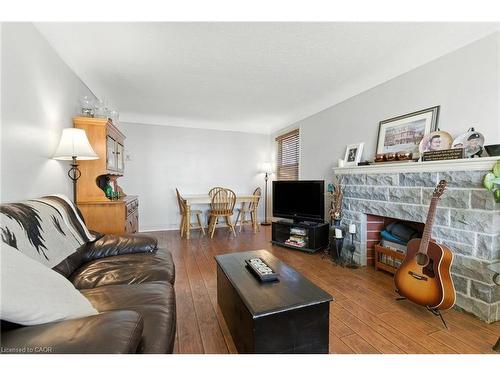 608 Fennell Avenue E, Hamilton, ON - Indoor Photo Showing Living Room With Fireplace