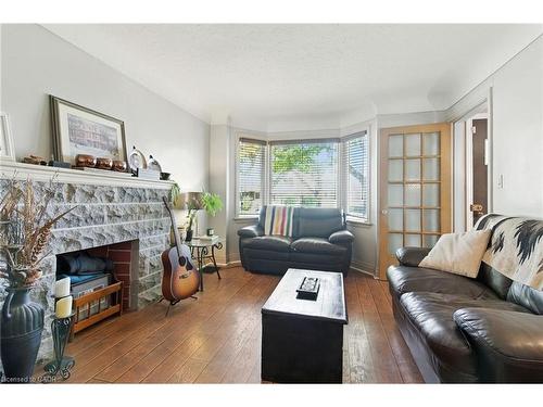 608 Fennell Avenue E, Hamilton, ON - Indoor Photo Showing Living Room With Fireplace