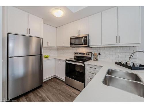 103-265 Cotton Grass Street, Kitchener, ON - Indoor Photo Showing Kitchen With Stainless Steel Kitchen With Double Sink With Upgraded Kitchen