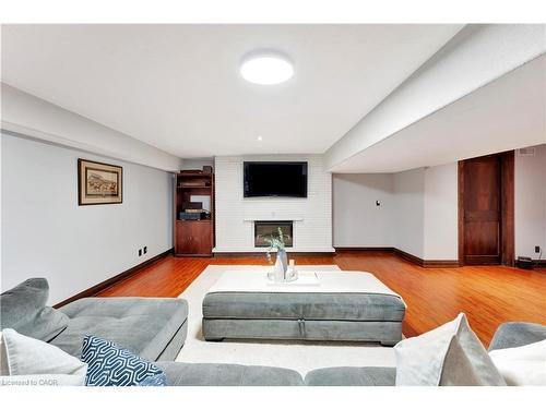 11 Maple Hill Drive, Kitchener, ON - Indoor Photo Showing Living Room With Fireplace
