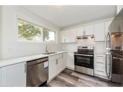 76 Woodman Drive N, Hamilton, ON - Indoor Photo Showing Kitchen With Stainless Steel Kitchen With Double Sink