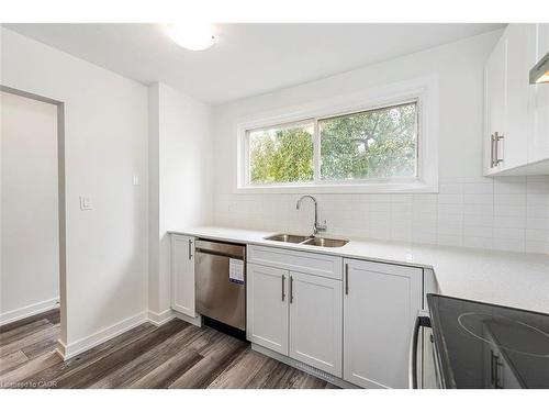 76 Woodman Drive N, Hamilton, ON - Indoor Photo Showing Kitchen With Double Sink
