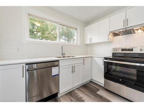 76 Woodman Drive N, Hamilton, ON - Indoor Photo Showing Kitchen With Stainless Steel Kitchen With Double Sink