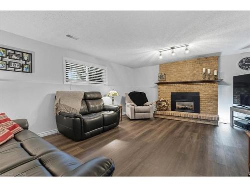 361 Cornerbrook Place, Waterloo, ON - Indoor Photo Showing Living Room With Fireplace