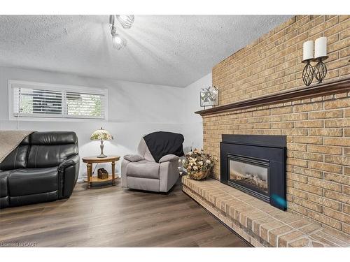 361 Cornerbrook Place, Waterloo, ON - Indoor Photo Showing Living Room With Fireplace