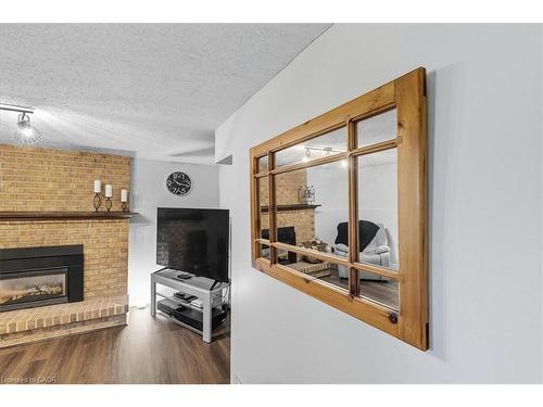 361 Cornerbrook Place, Waterloo, ON - Indoor Photo Showing Living Room With Fireplace