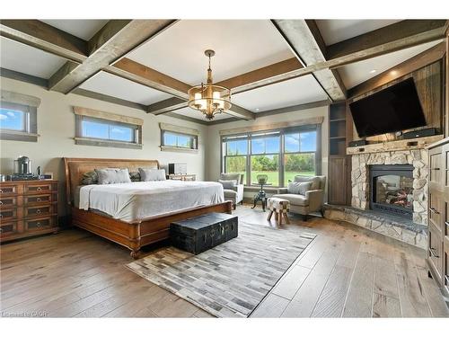 437 6Th Concession Road E, Flamborough, ON - Indoor Photo Showing Bedroom With Fireplace