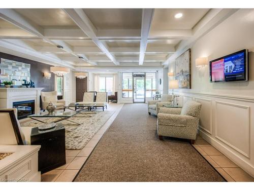 505-265 Westcourt Place, Waterloo, ON - Indoor Photo Showing Other Room With Fireplace