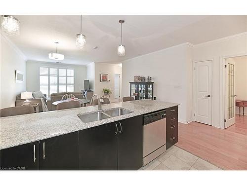 112-383 Main Street, Milton, ON - Indoor Photo Showing Kitchen With Double Sink