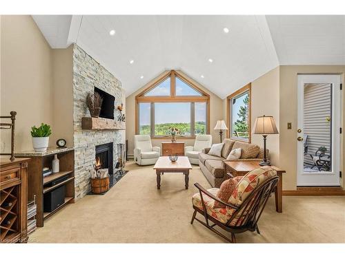 1-131 Grandview Hilltop Drive, Huntsville, ON - Indoor Photo Showing Living Room With Fireplace