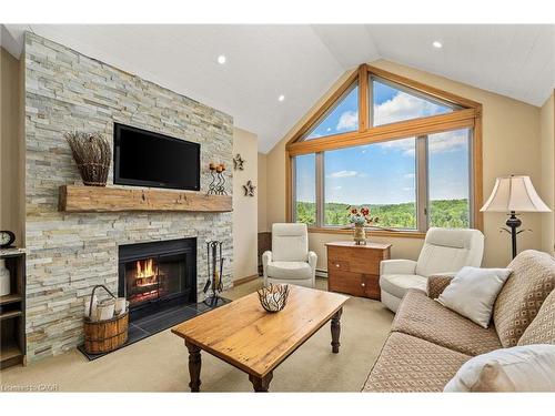 1-131 Grandview Hilltop Drive, Huntsville, ON - Indoor Photo Showing Living Room With Fireplace