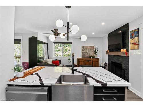 3-15 Dawson Drive, Collingwood, ON - Indoor Photo Showing Dining Room With Fireplace